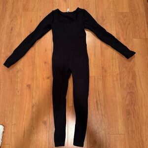 Black long sleeve activewear bodysuit